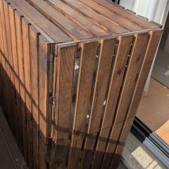 Cobertura de madeira já tratada e com acabamento.