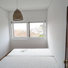 Quarto após pintura com cama